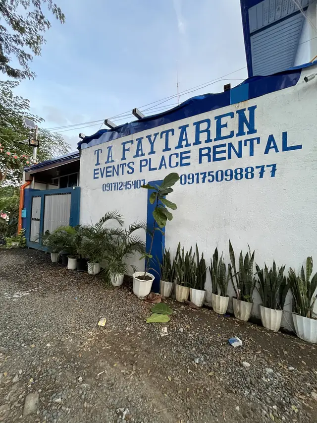 T.A. Faytaren Events Place Rental painted wall with phone numbers