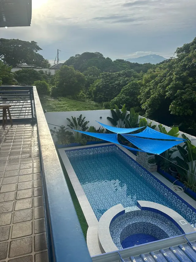 Pool seen from the upper deck with a mountain view