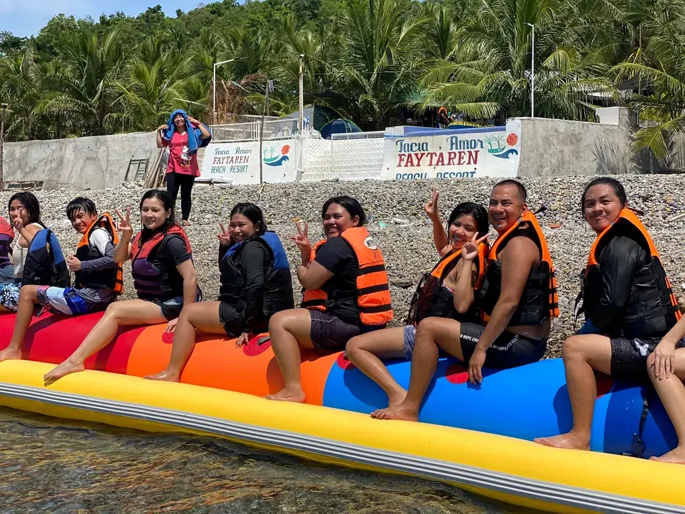 Banana boat ride off the shore of Tacia Amore Beach Resort