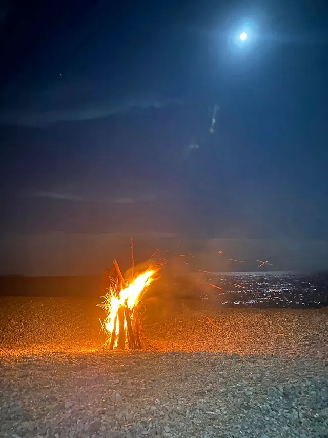 Bonfire on the beach under the moon