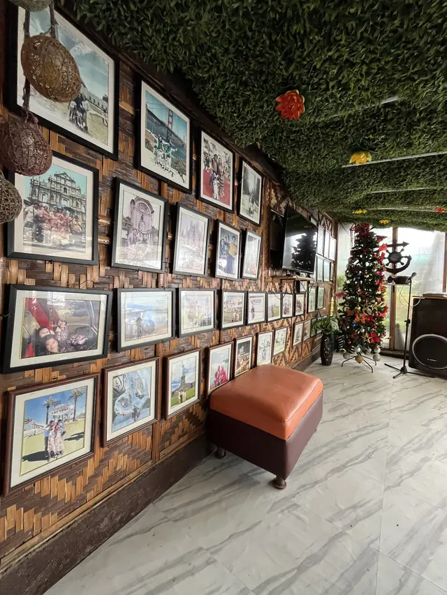Framed photos lining the common area wall