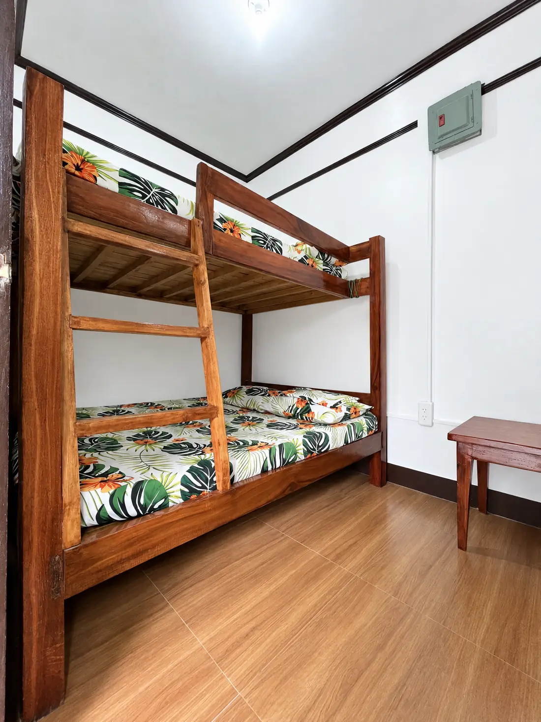 Standard room with wooden bunk beds